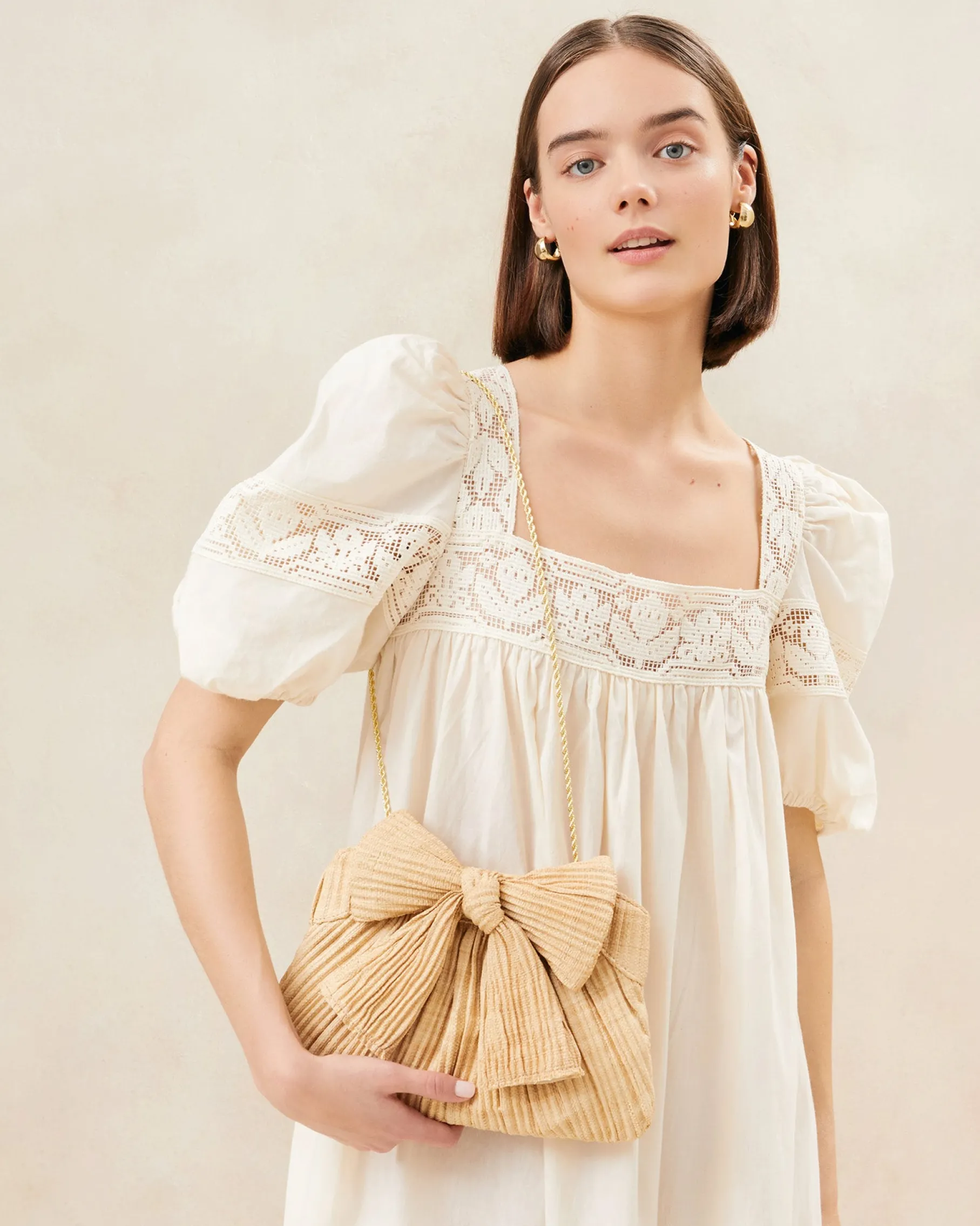 Rayne Pearl Bow Clutch